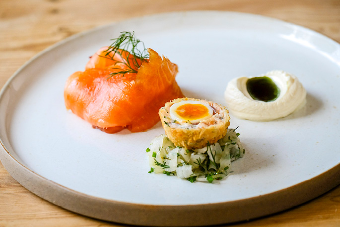 Cold smoked salmon with hot smoked salmon scotch egg and pickled fennel